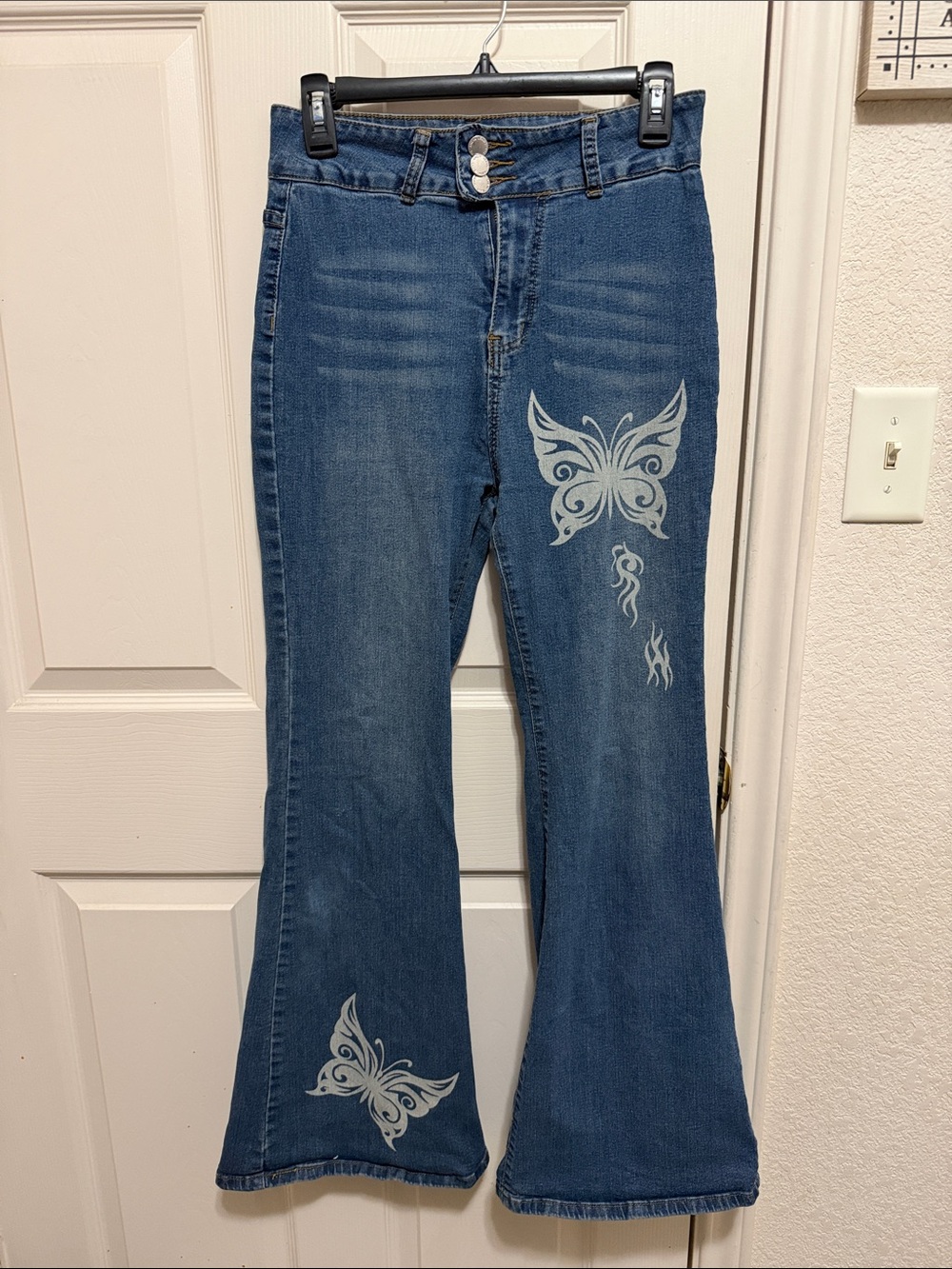 SHEIN Blue Flare Jeans with Butterfly Graphics
